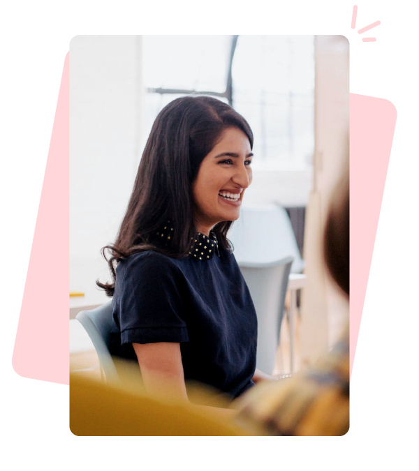 NSW Government case study - side-on photo of a woman in a dark, short-sleeved top, laughing