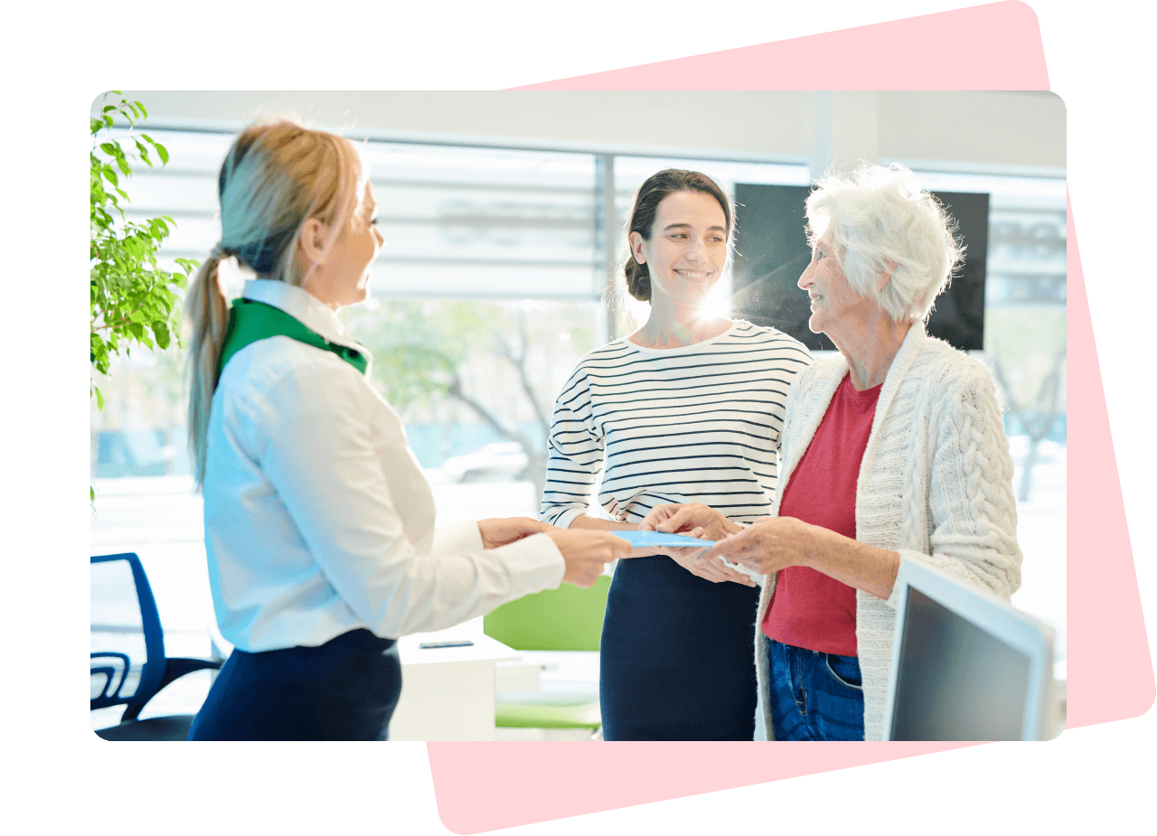 Mother and daughter in a back branch talking to a member of staff